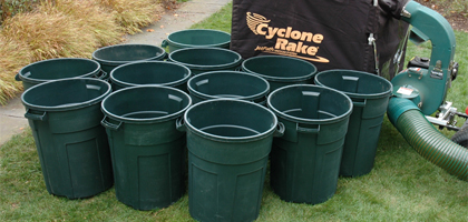 Our tow behind leaf collector system holds 12 trash barrels full of lawn debris.