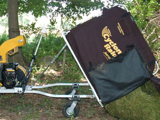 the Cyclone Rake collector in the full unloading position.