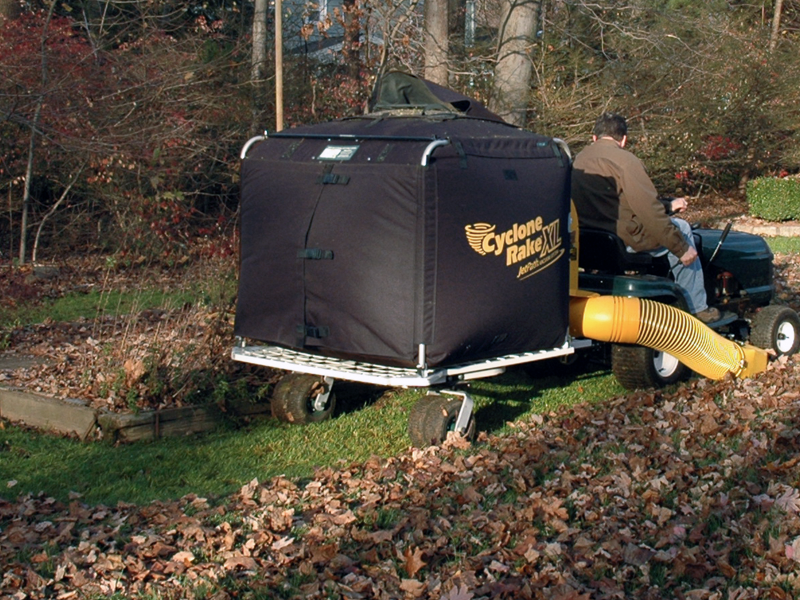 Dual Pro wheels attached to a Cyclone Rake going through the leaves.