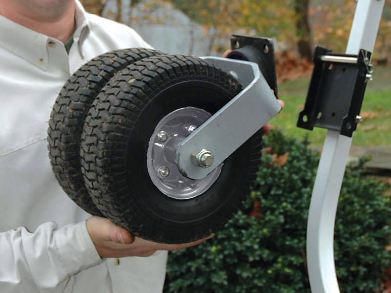 Man holding one Dual-Pro Wheel