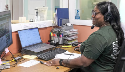 Cyclone Rake customer service representative on a call