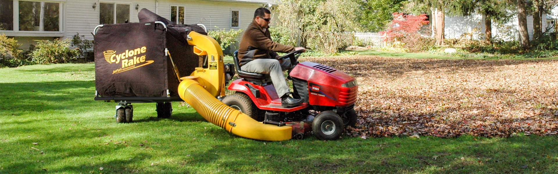 man struggling with a leaf blower and then happy to be using a Cyclone Rake